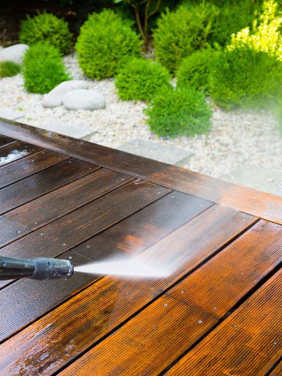 Deck being pressure washed
