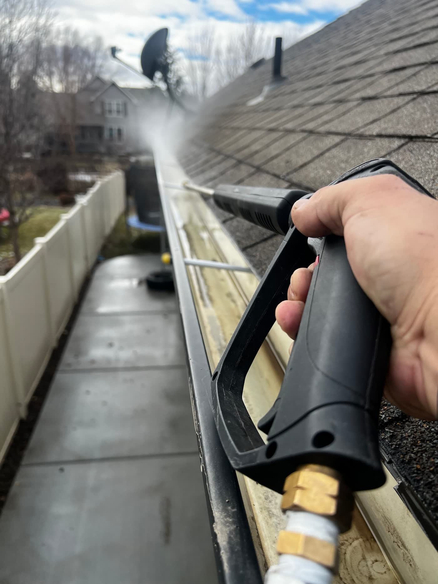 Gutter being cleaned out