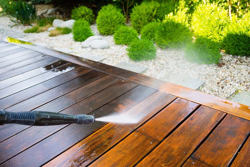 Deck being pressure washed